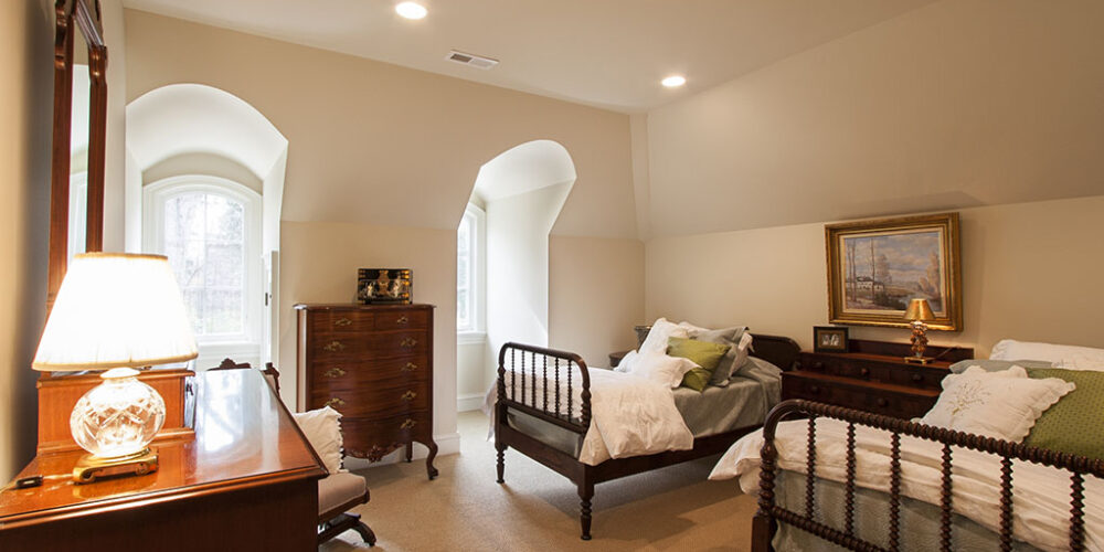 Bunk room guest room by Glenn Cope Custom Home Builders