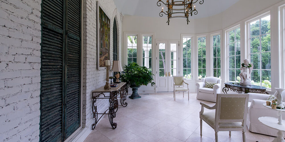Enclosed patio sunroom by Glenn Cope Custom Home Builders
