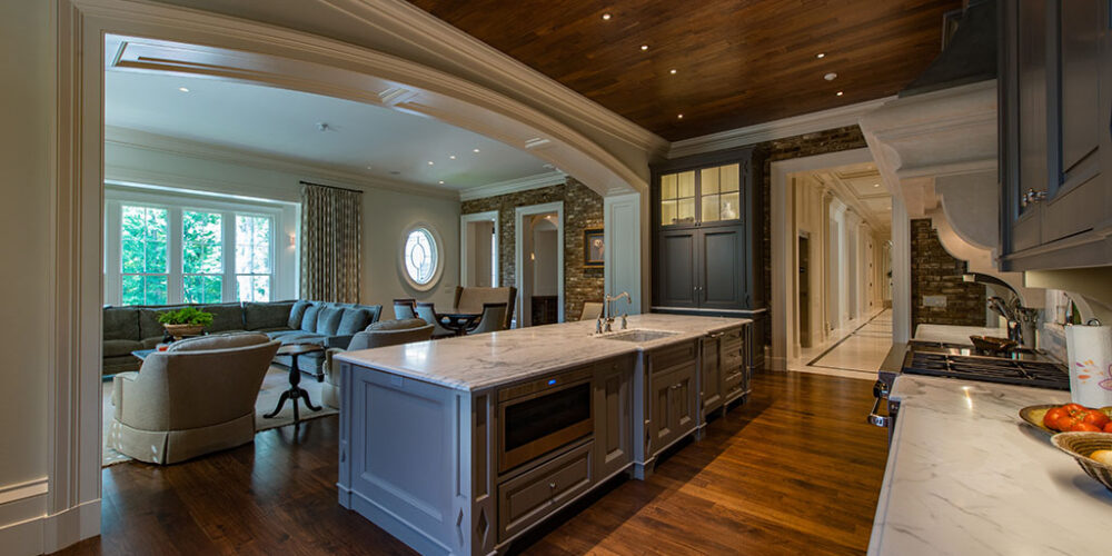 Kitchen and family sitting room by Glenn Cope Custom Home Builders