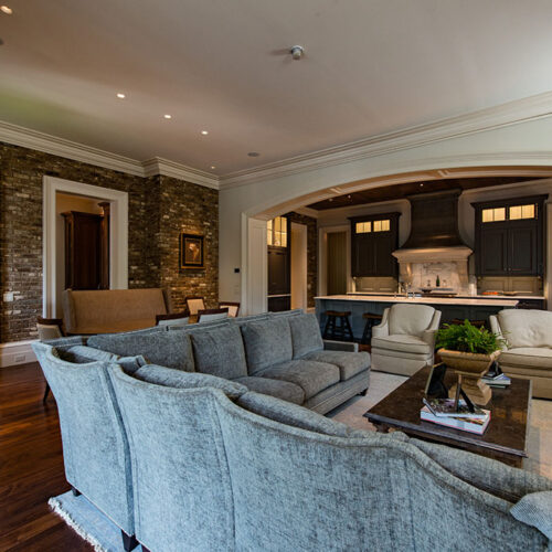 Kitchen and family sitting room by Glenn Cope Custom Home Builders