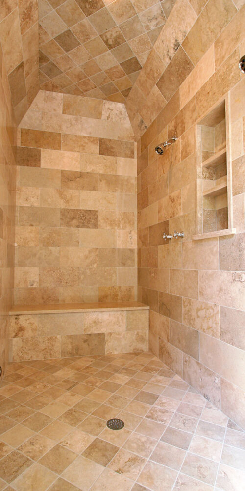 Custom wetroom dual shower with bench by Glenn Cope Custom Home Builders