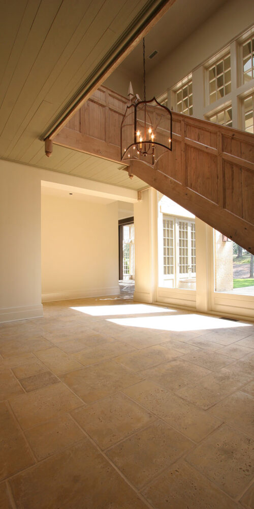 Detailed entryway and staircase by Glenn Cope Custom Home Builders