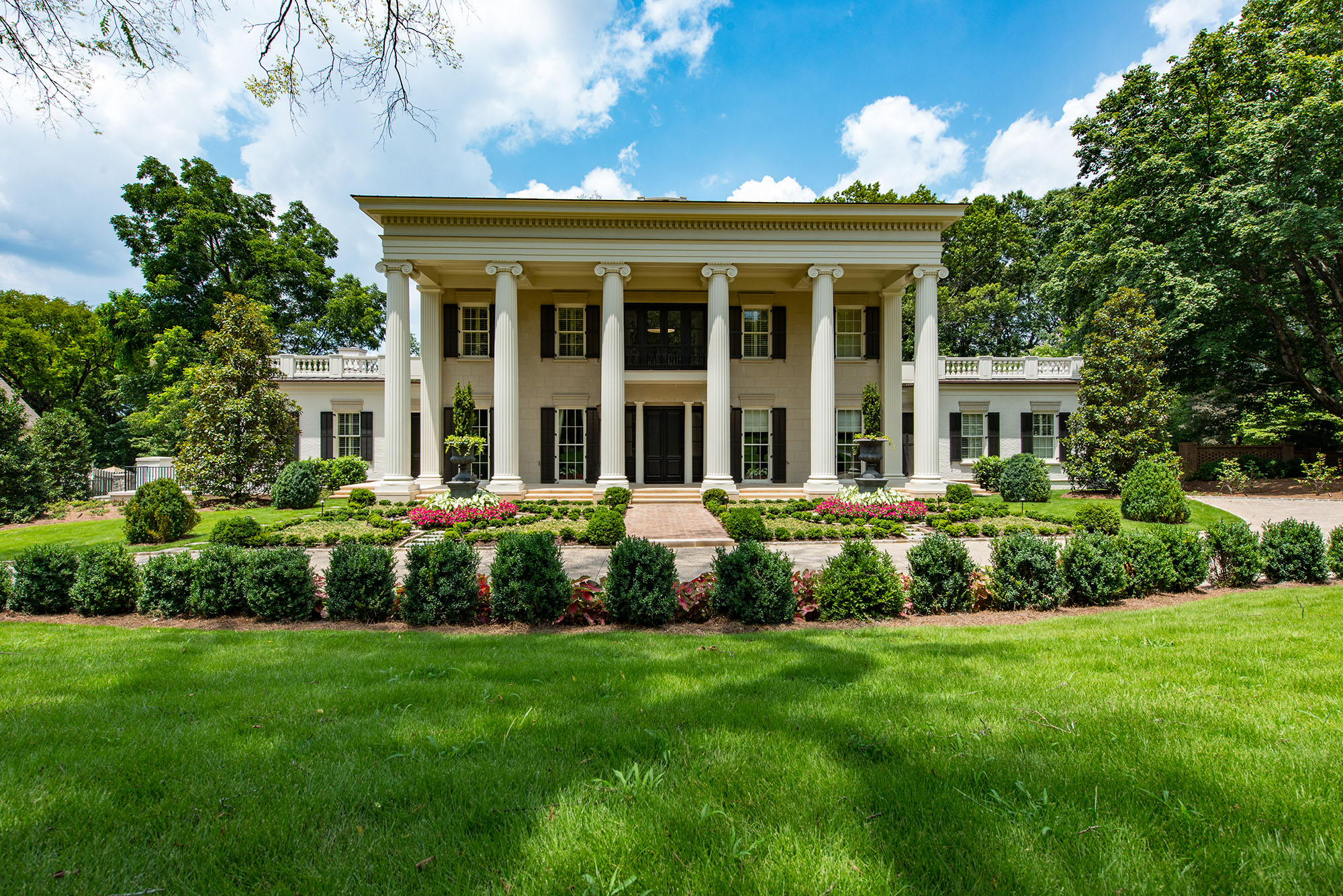 Greek Revival styled home by Glenn Cope Custom Home Builders