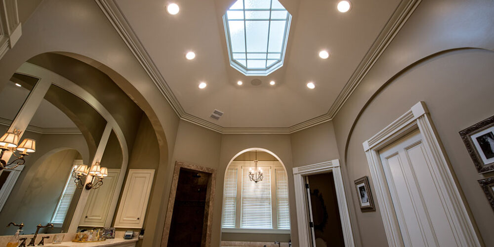 Master bathroom with skylight by Glenn Cope Custom Home Builders