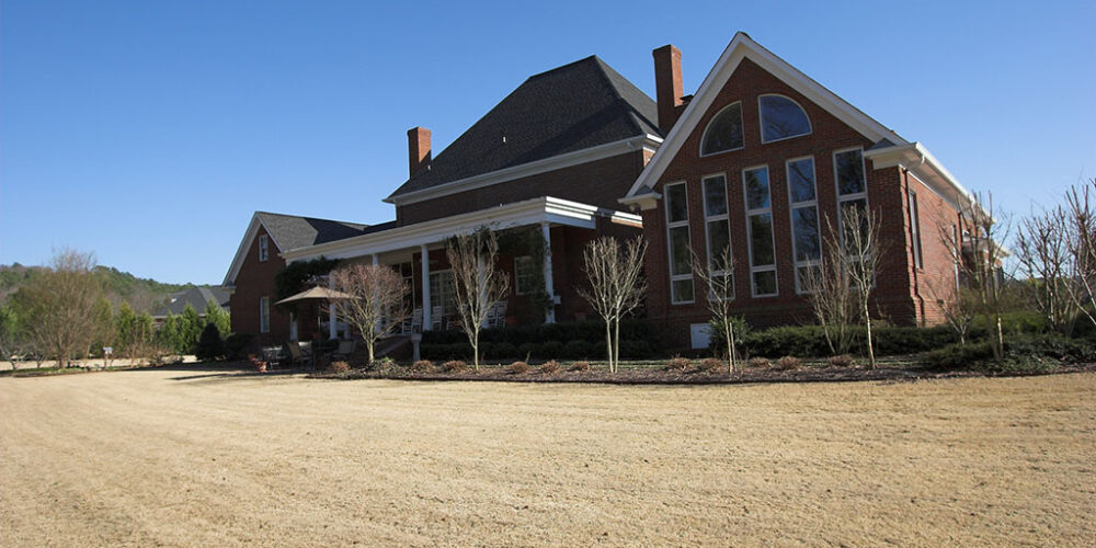 Backyard of Colonial styled home by Glenn Cope Custom Home Builders