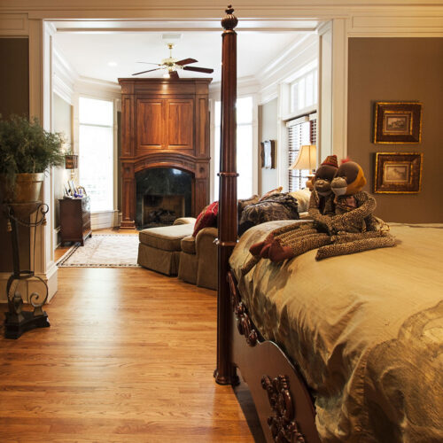 Custom master bedroom with sitting room Greek revival style custom home by Glenn Cope Custom Home Builders