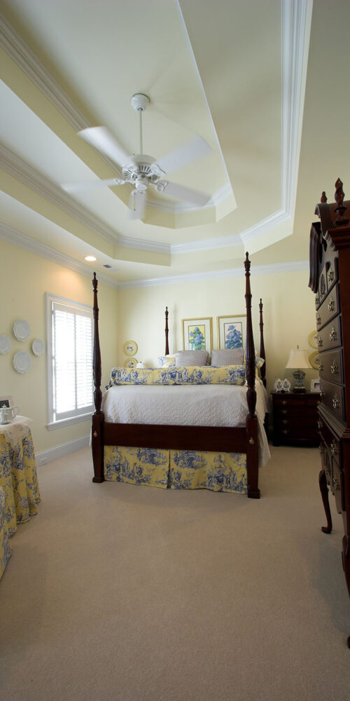 Master bedroom with tray ceiling by Glenn Cope Custom Home Builders