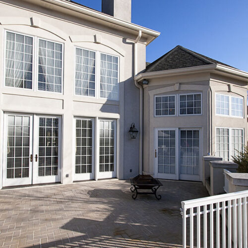 Terrace of traditional European luxury home Traditional European mansion by Glenn Cope Custom Home Builders