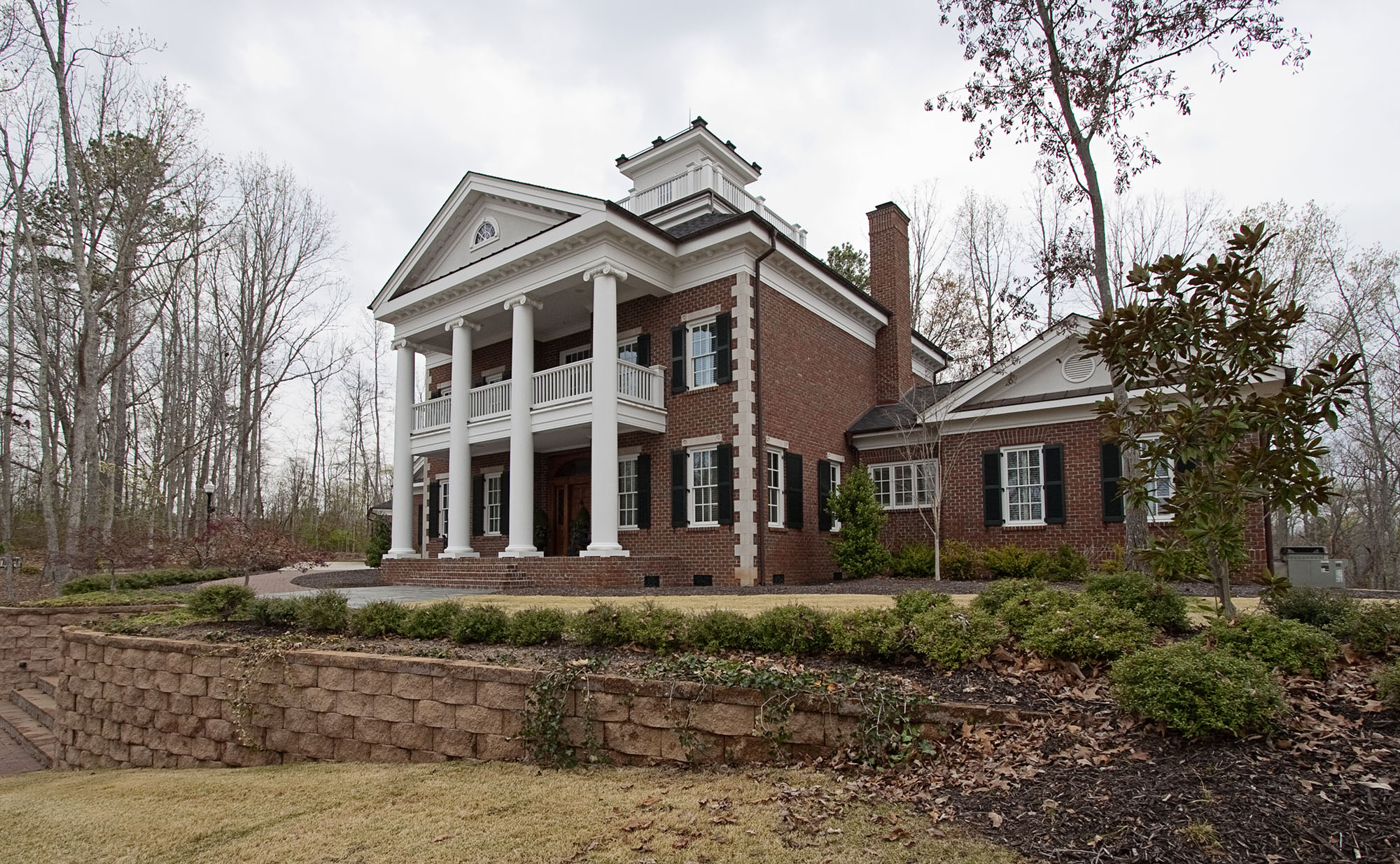 Greek Revival styled home by Glenn Cope Custom Home Builders